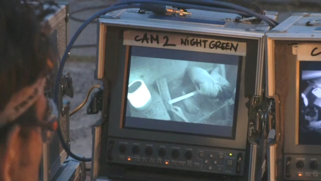 A night vision monitor marked Cam 2 shows the inside of the coop