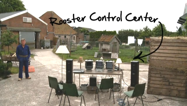 The Rooster Control Centre: monitors, speakers and lamps set up in the farmyard