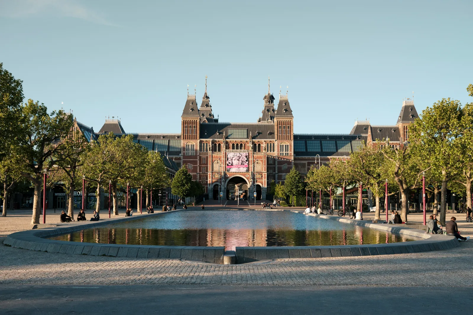 The Rijksmuseum seen across the pond on the Museumplein